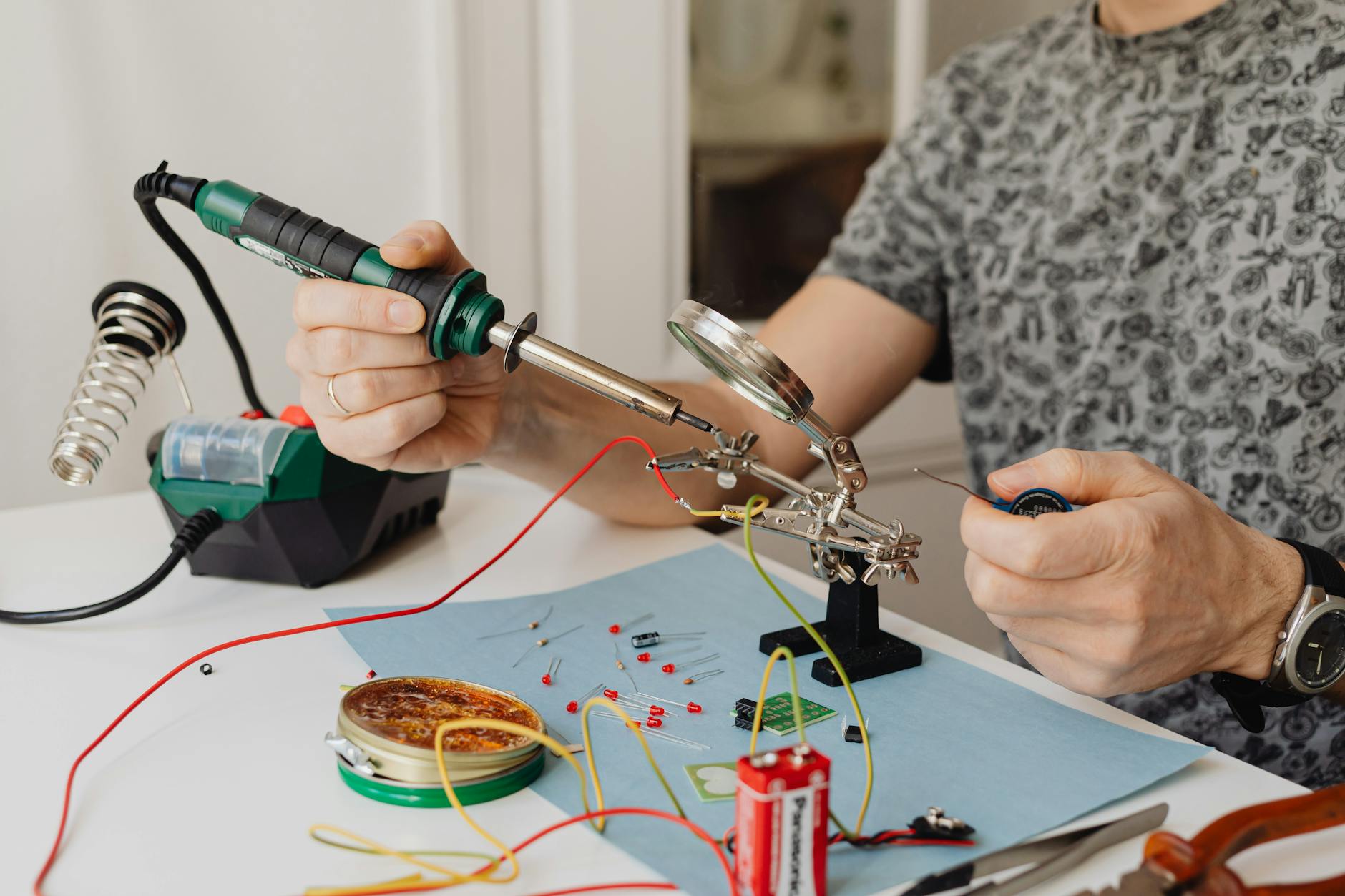 electrician calculating cable size with multimeter