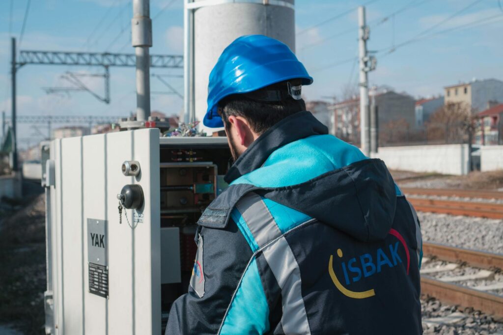 electrician inspecting residential circuit breaker panel