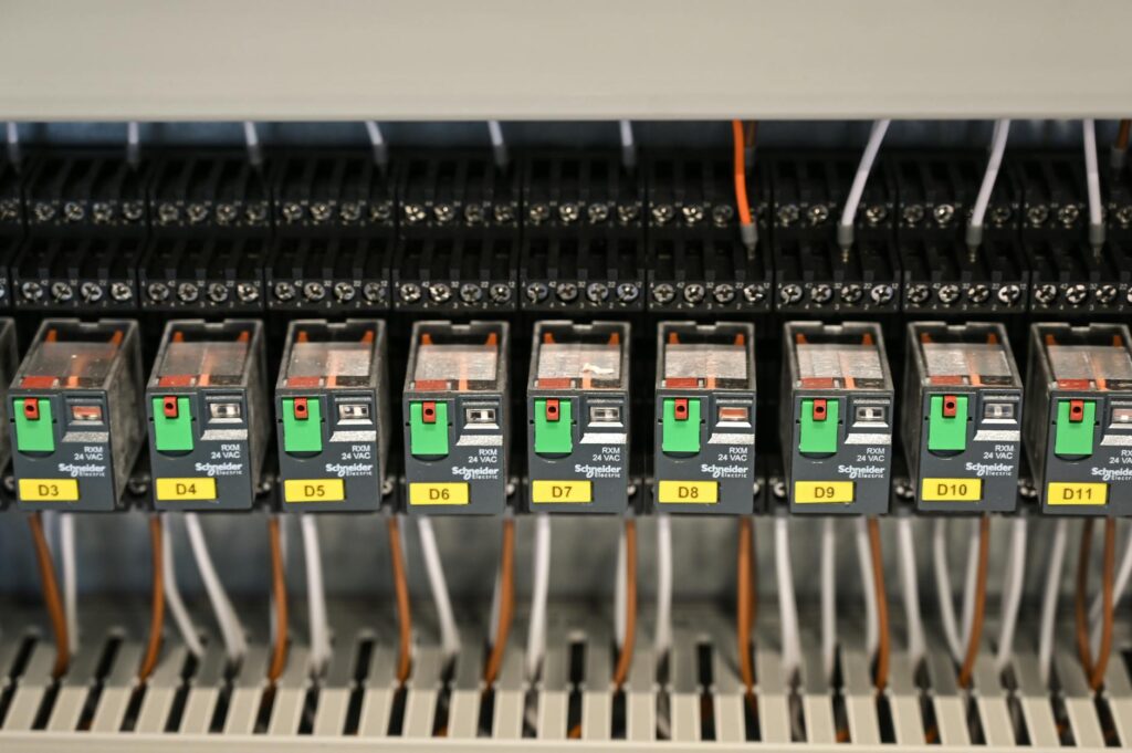 electrician installing circuit breaker close-up