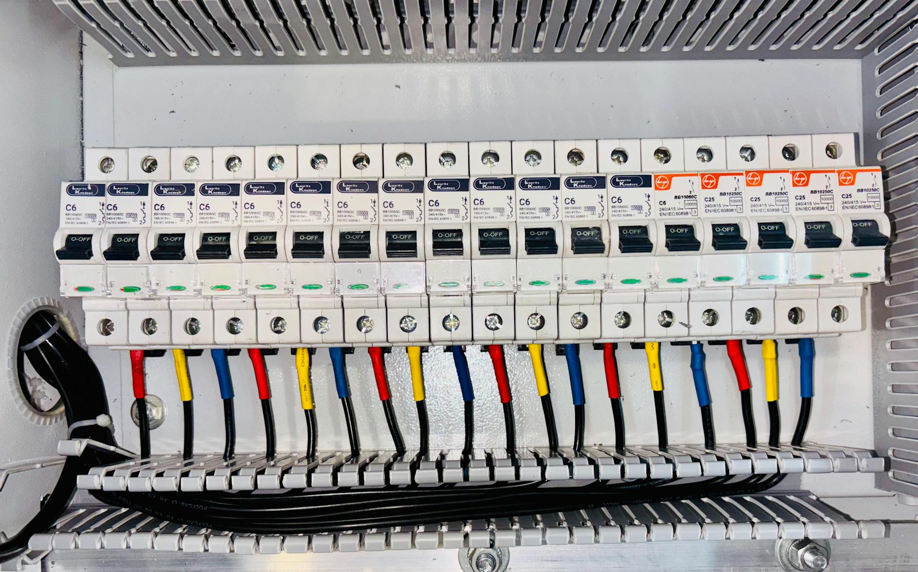 electrician installing circuit breaker close-up