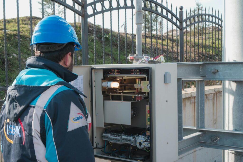 electrician rewiring old residential electrical panel and wiring