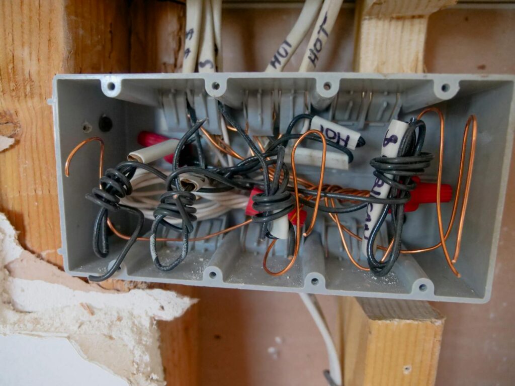 burnt electrical panel wiring short circuit fire hazard