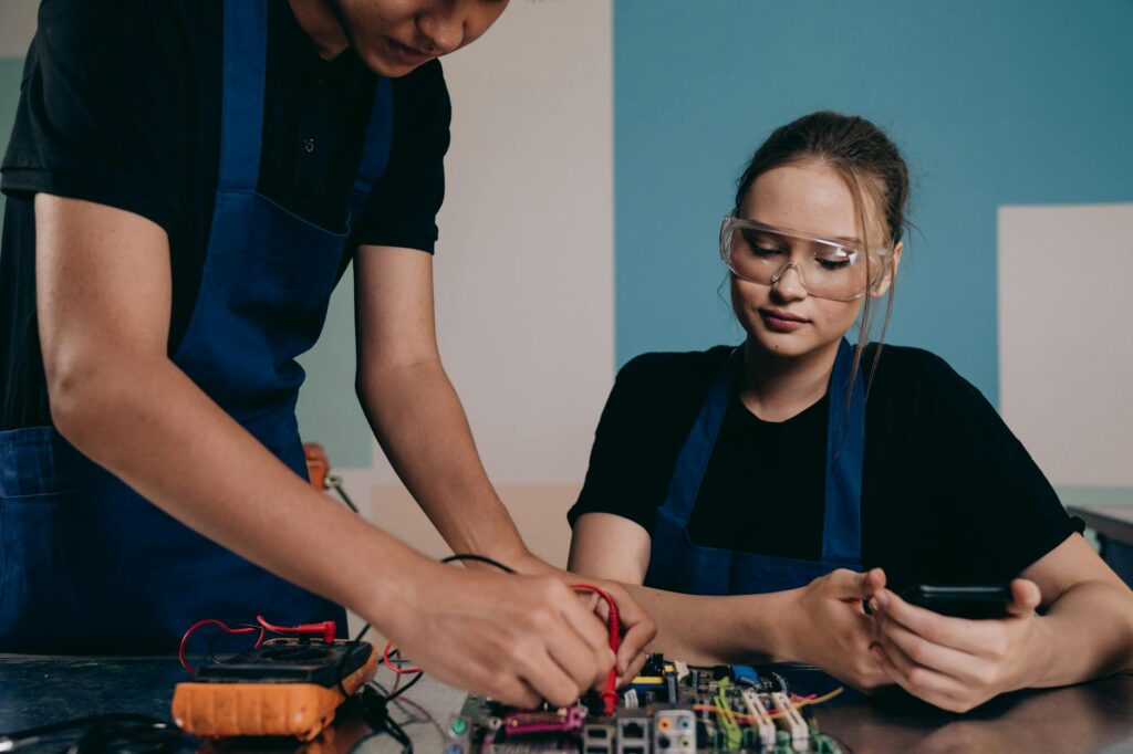 electrical technician testing LED light flickering with multimeter near wall switch