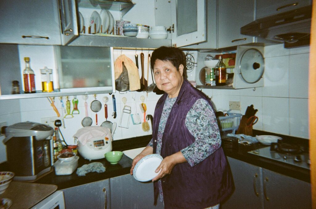 malfunctioning rice cooker in dimly lit kitchen